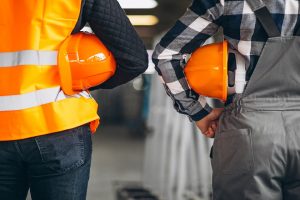 Two colleagues at a factory
